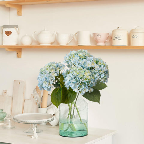 Leftover hydrangea decor elevates dining room ambiance.