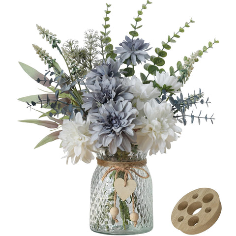 Leftover silk dahlia flowers in vase offer long-lasting color for table centerpieces.