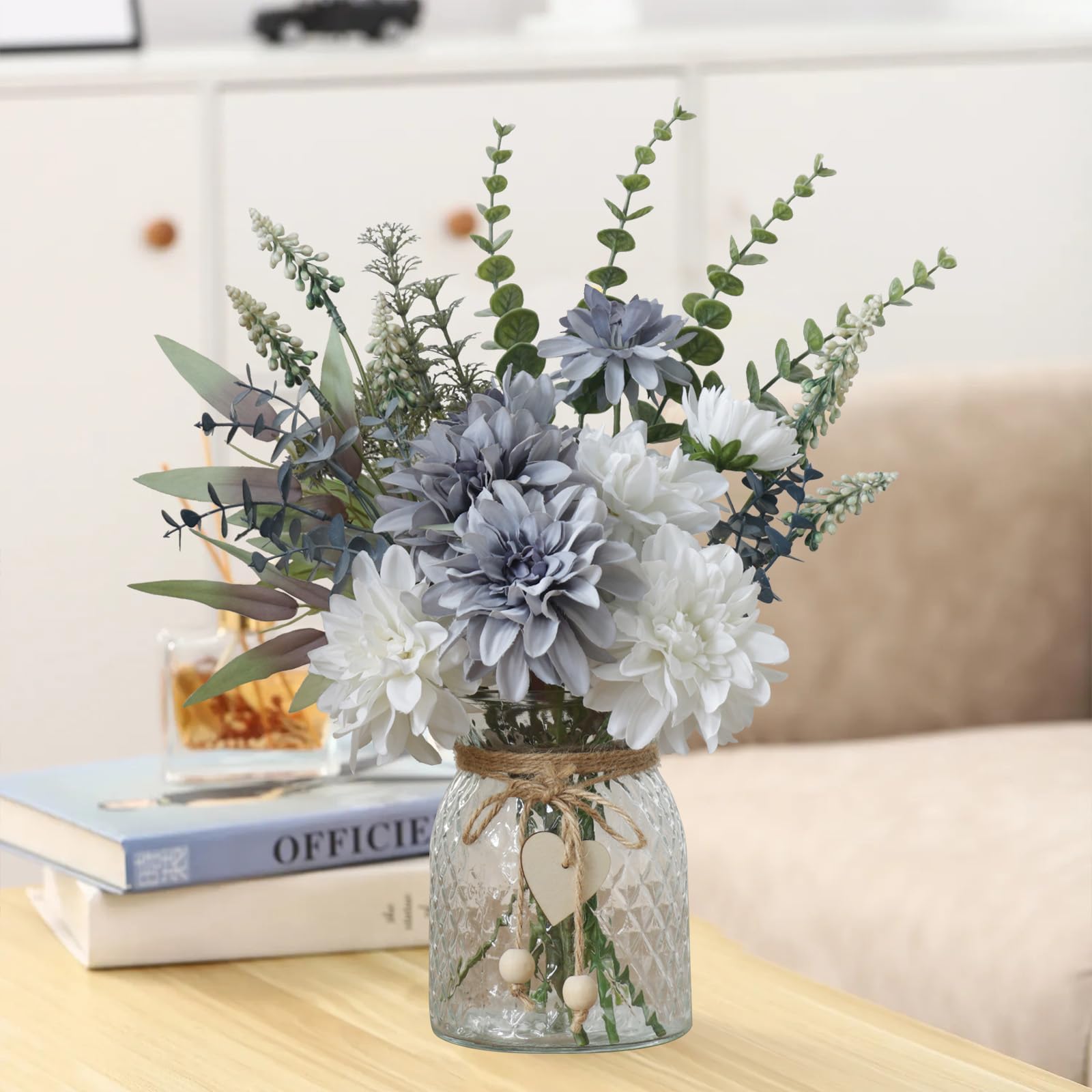 Leftover wooden flower holder holds dahlia stems securely for stable arrangements.