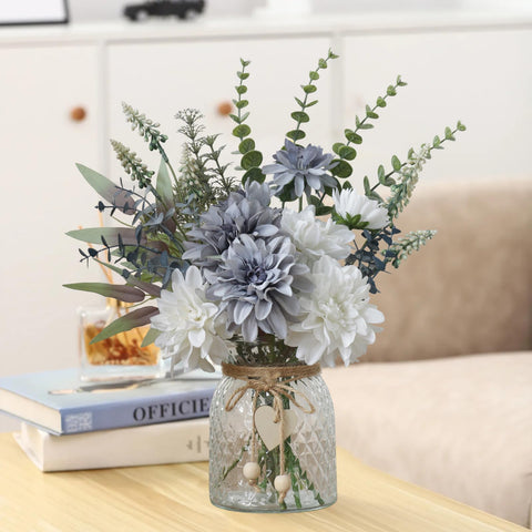 Leftover wooden flower holder holds dahlia stems securely for stable arrangements.