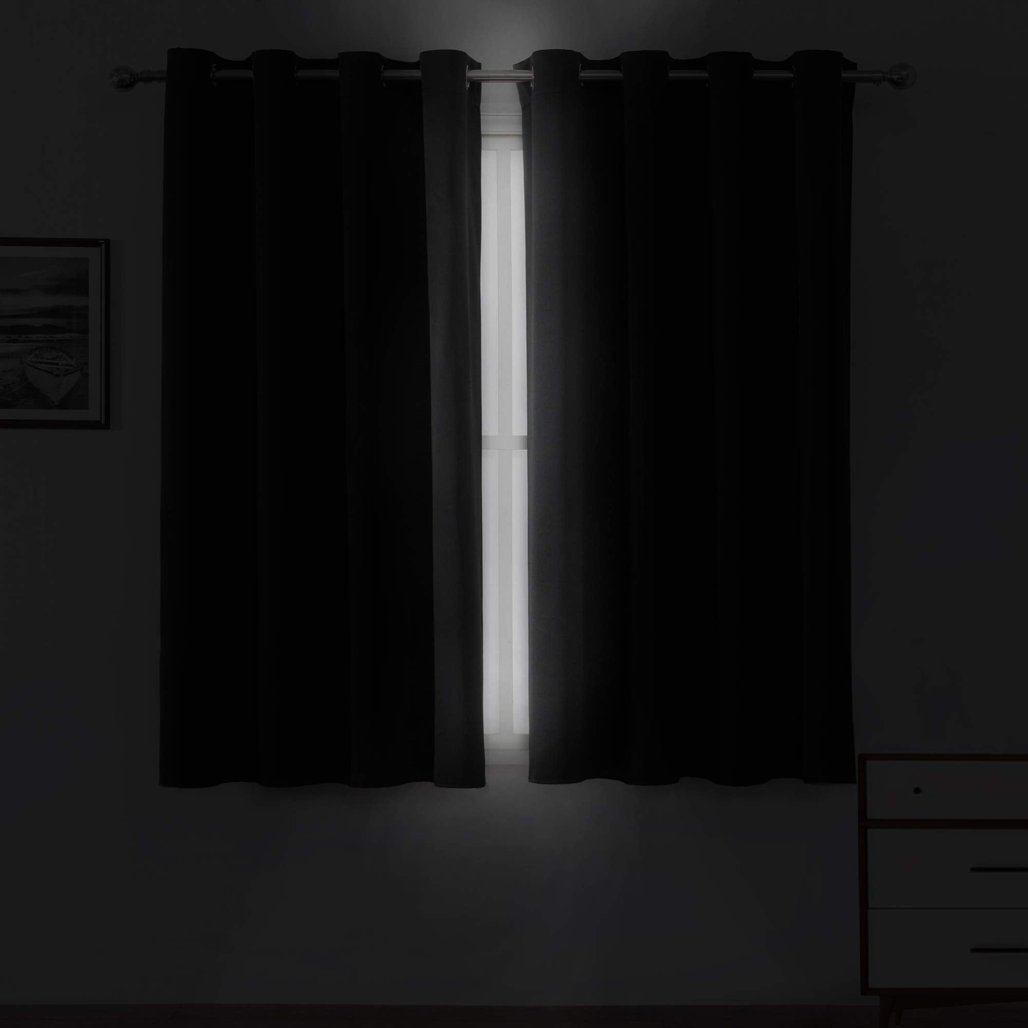 LEMOMO blackout curtains with silver grommets for smooth operation.