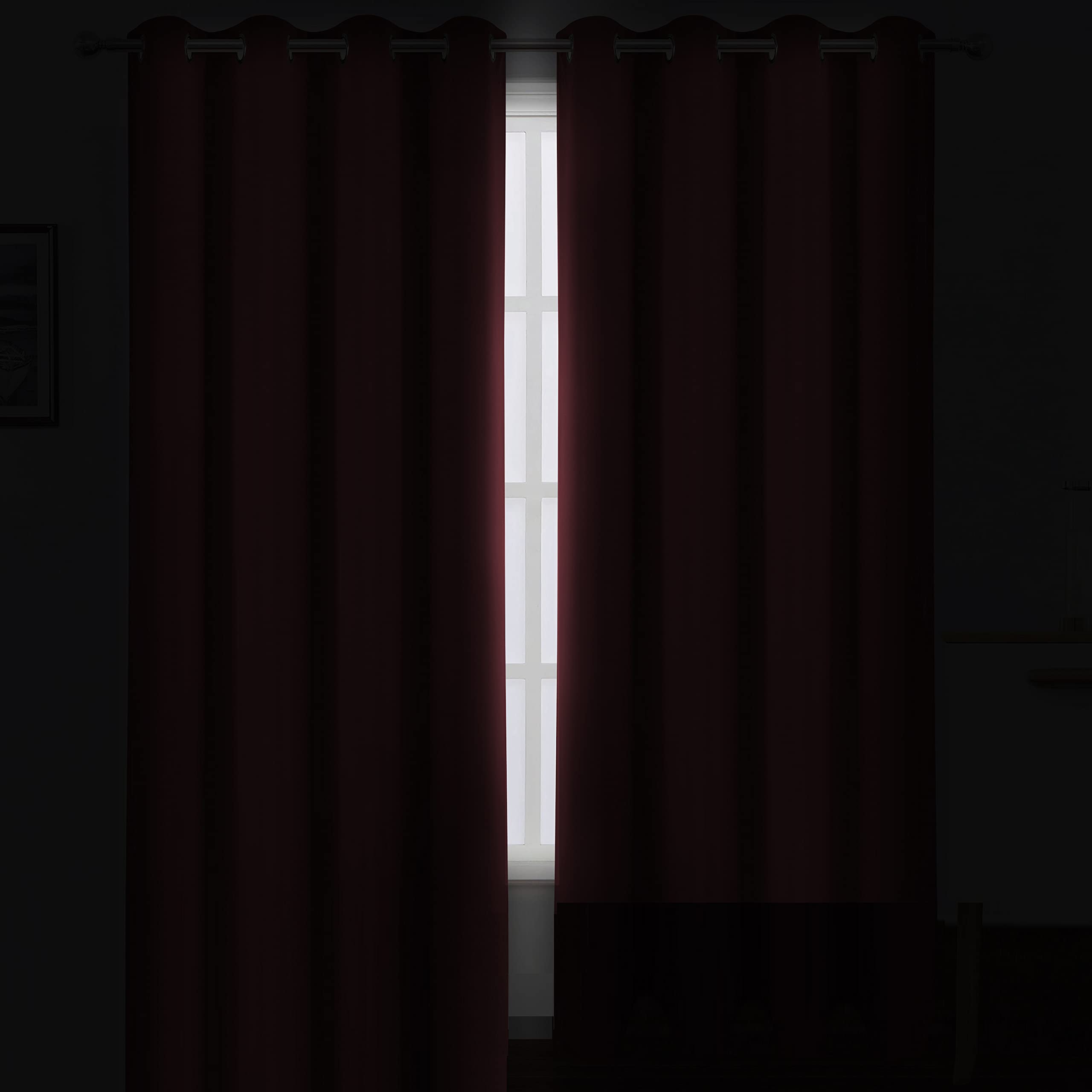 Close-up of silver grommets on LEMOMO burgundy red curtains