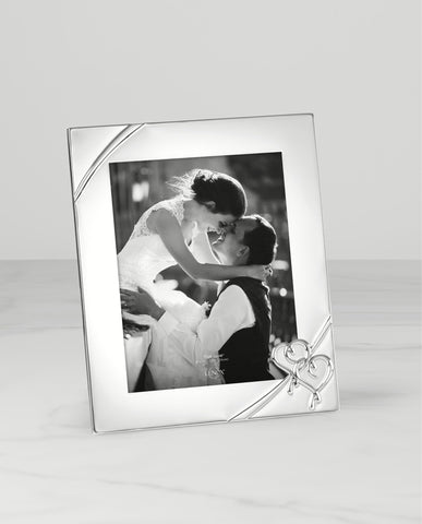 Lenox silver-plated zinc alloy finish enhances treasured photos.