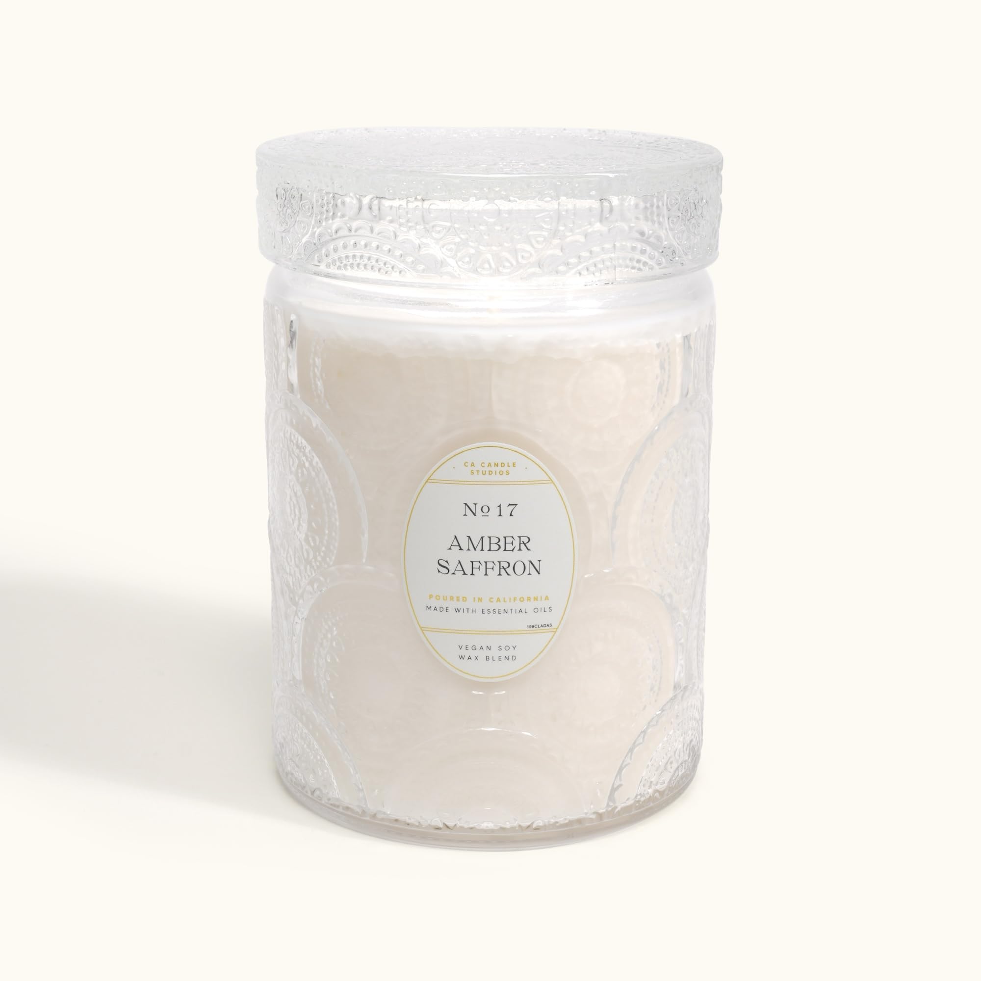 LEOBEN COMPANY amber saffron candle closeup wick for soothing fragrance.