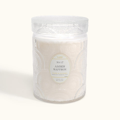 LEOBEN COMPANY amber saffron candle closeup wick for soothing fragrance.