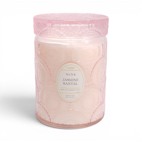 LEOBEN CO Jasmine Santal candle in embossed jar creates elegant ambiance in any room.
