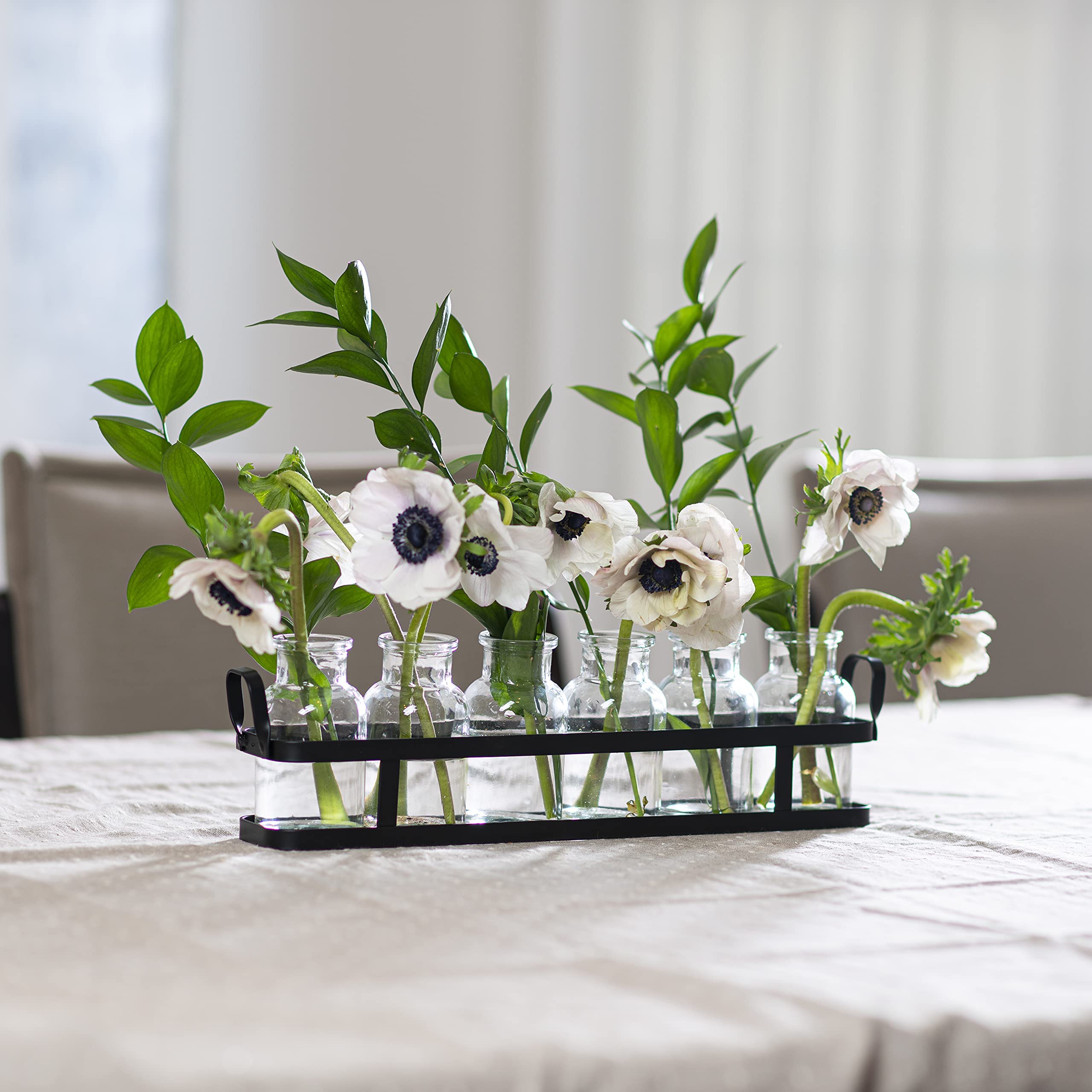 Le'raze glass vases closeup show crystal clarity for refined floral arrangements.