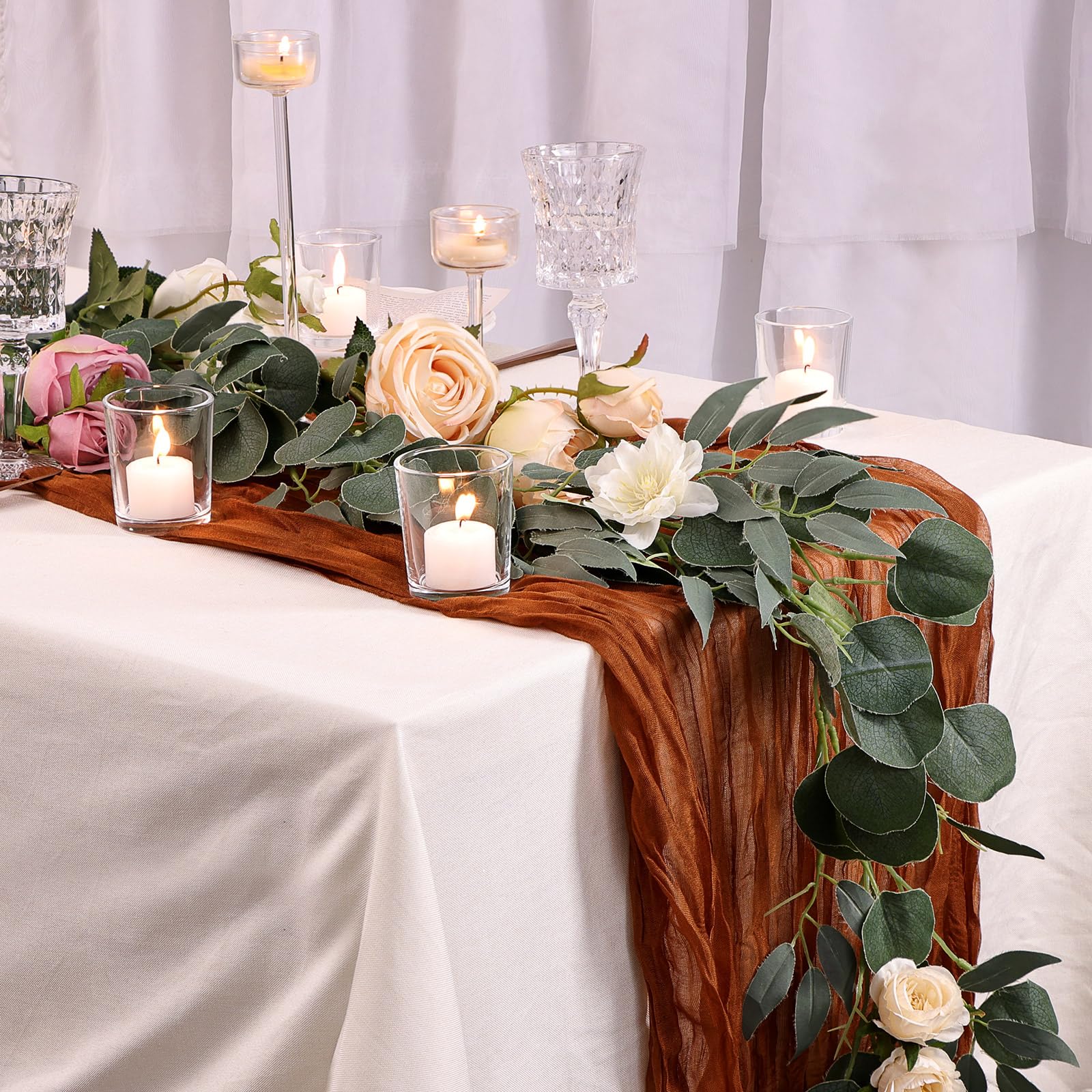 Letine wedding centerpiece votive holder on a table with warm glow.
