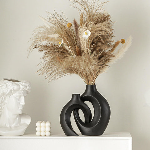 Levvohd taller vase close-up highlights slim neck and sturdy base