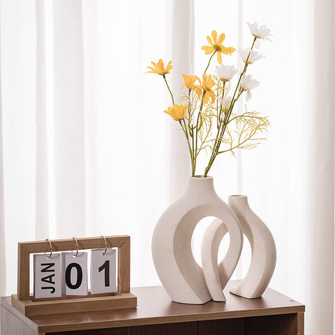Levvohd hollow ceramic vase short cream white highlights compact form for tabletops