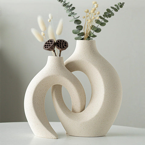Levvohd hollow ceramic vase tall cream white on shelf with modern silhouette for stylish shelves