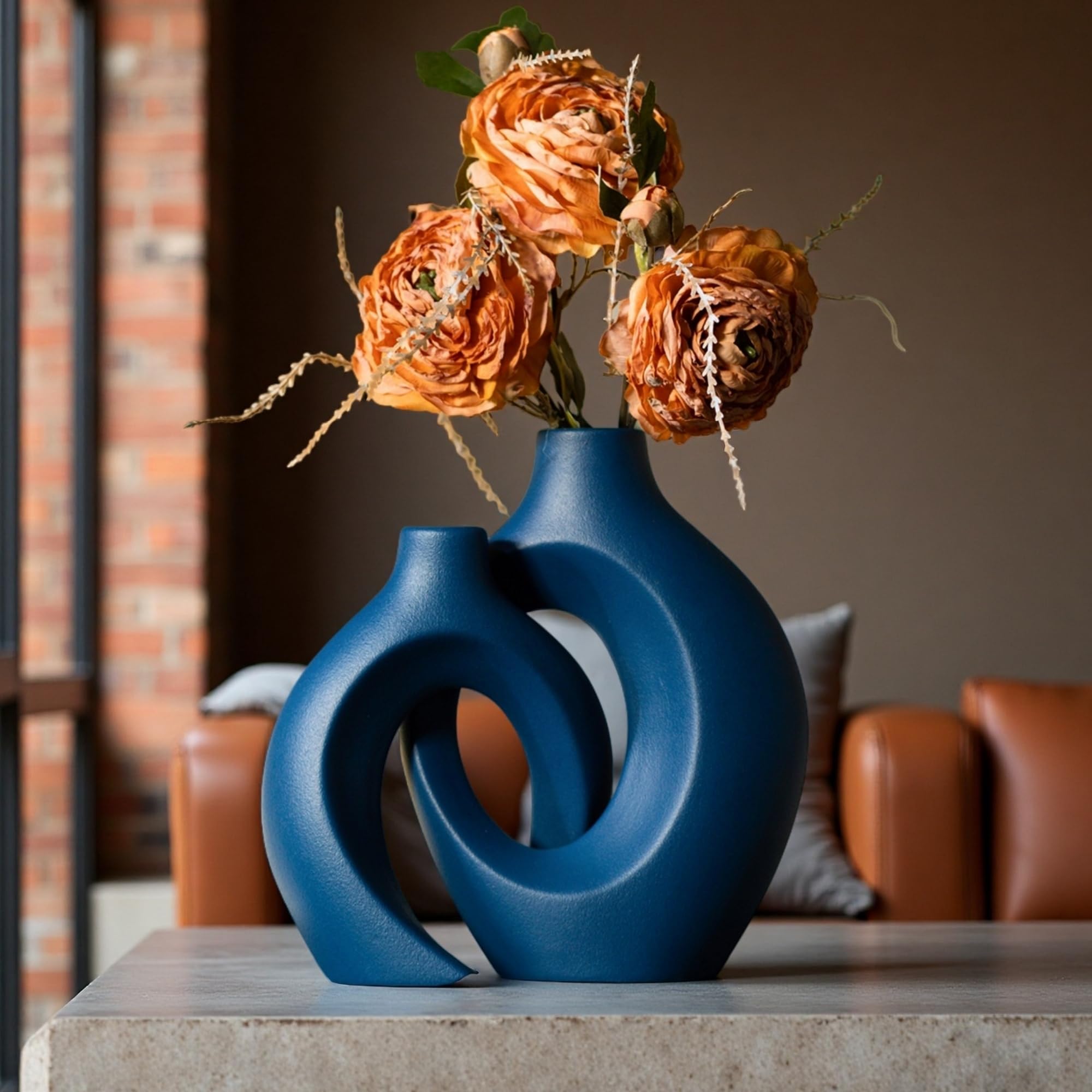 Levvohd Snuggle Hollow navy vase displayed on a console for coastal charm.