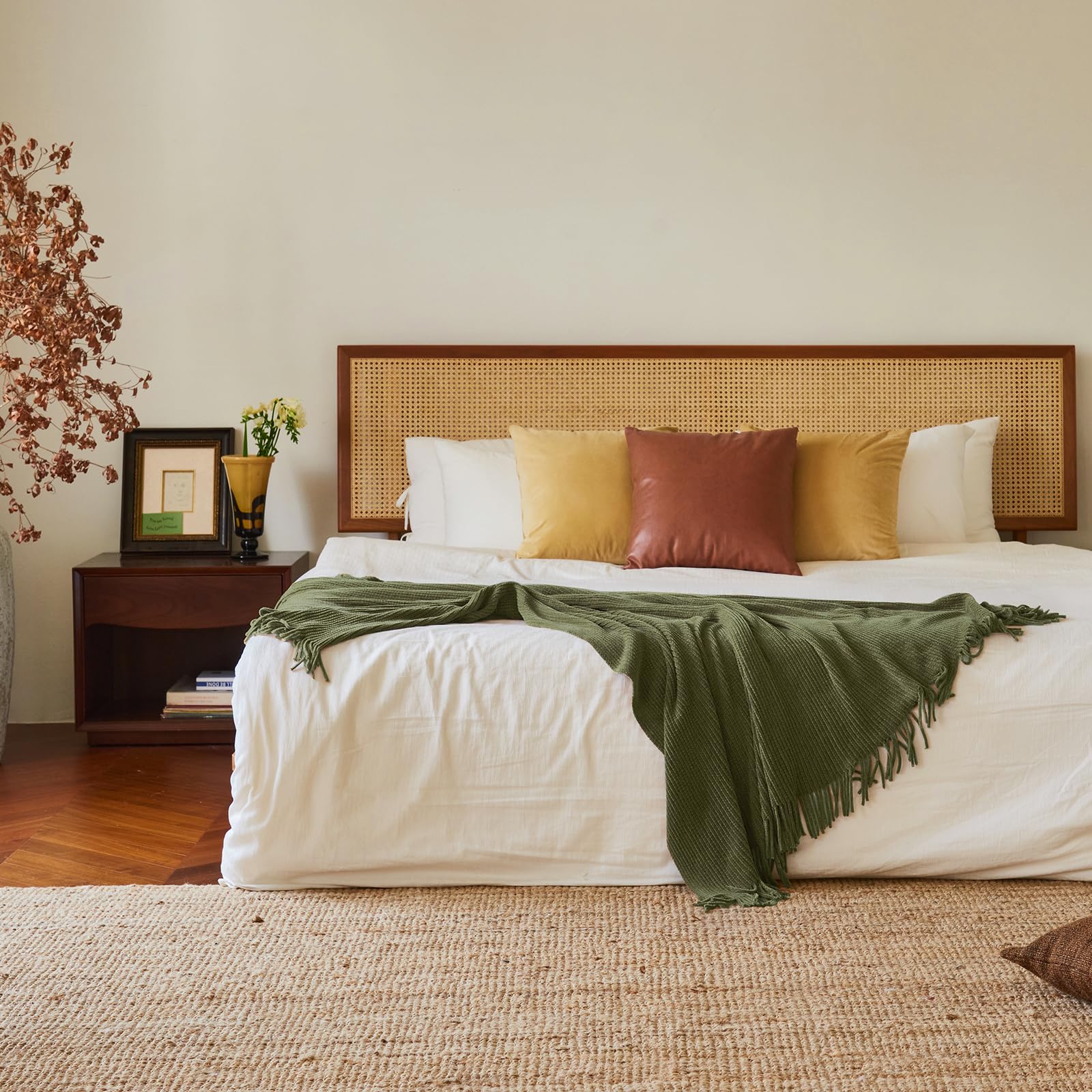 Lifein olive green throw on bed as stylish accent