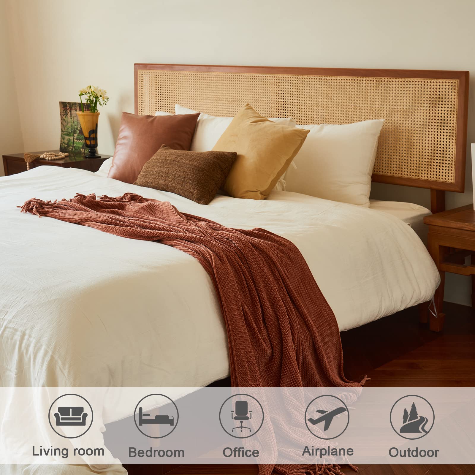 lifein rust colored blanket adds soft texture to bed setup.