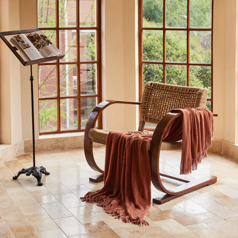 lifein farmhouse decor throw draped on chair for rustic style accent.