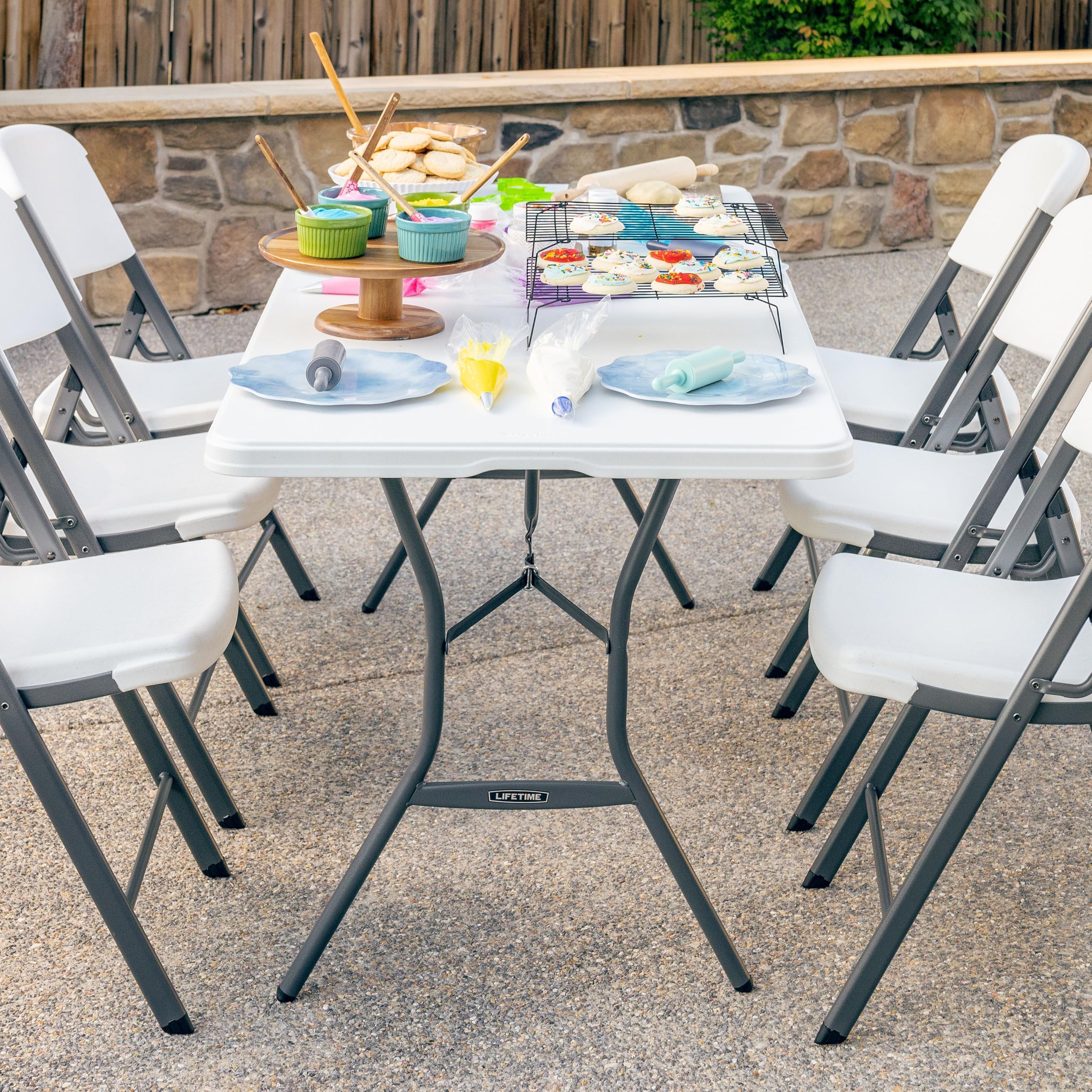 Lifetime 6-Foot Fold-In-Half Table outdoor-event readiness improves portability.