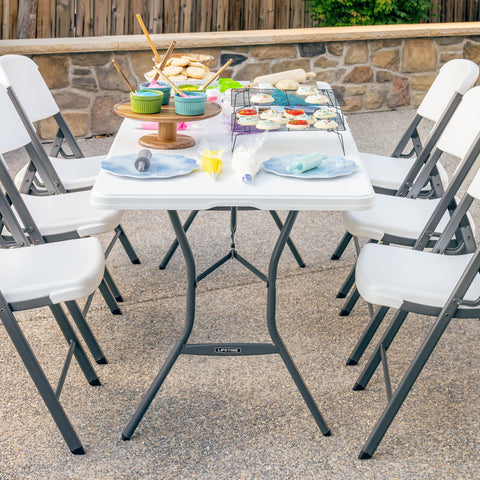 Lifetime 6-Foot Fold-In-Half Table outdoor-event readiness improves portability.