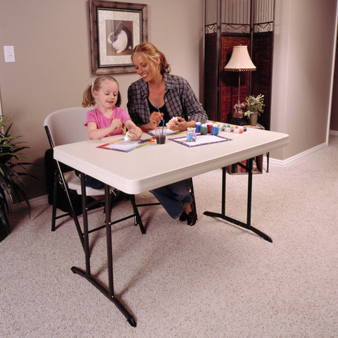 Lifetime 80568 table folded for compact, easy storage after events.
