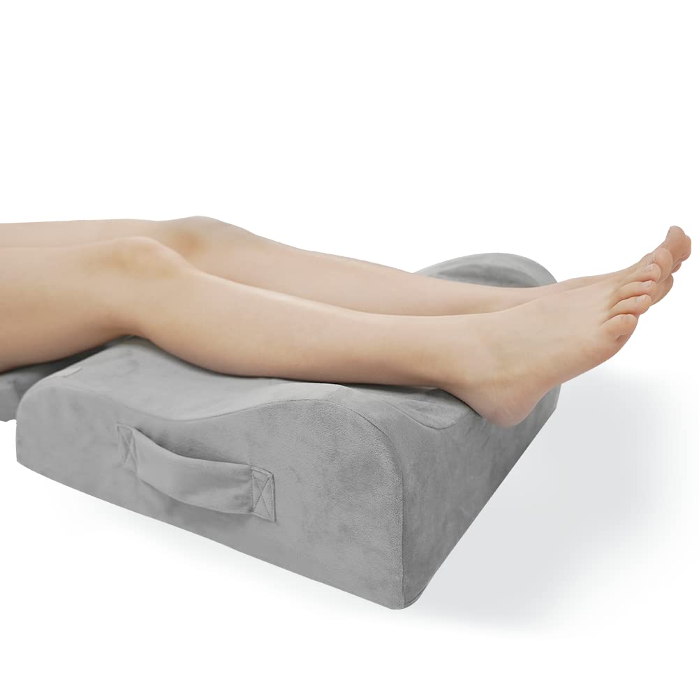 LightEase memory foam leg pillow elevating legs for circulation and swelling relief.