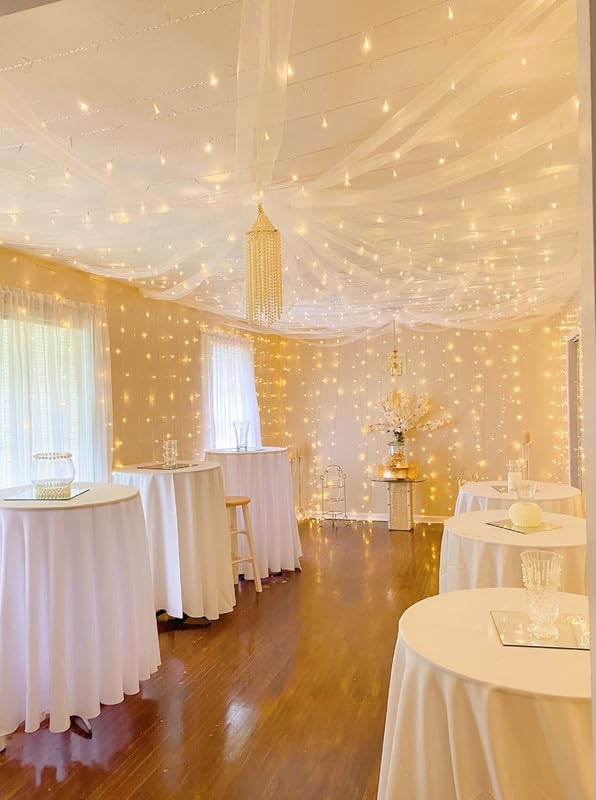 Lighting EVER LED curtain lights elevate tent scenery for parties.