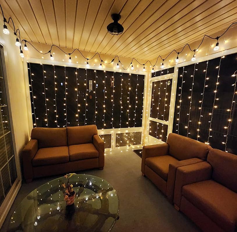 Lighting EVER curtain lights create porch-ceiling ambiance with warm illumination.
