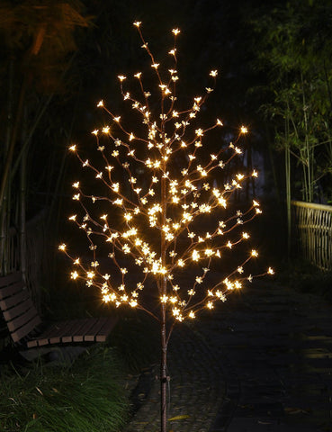 LIGHTSHARE 6.5ft cherry blossom tree lit for ambient living room display.
