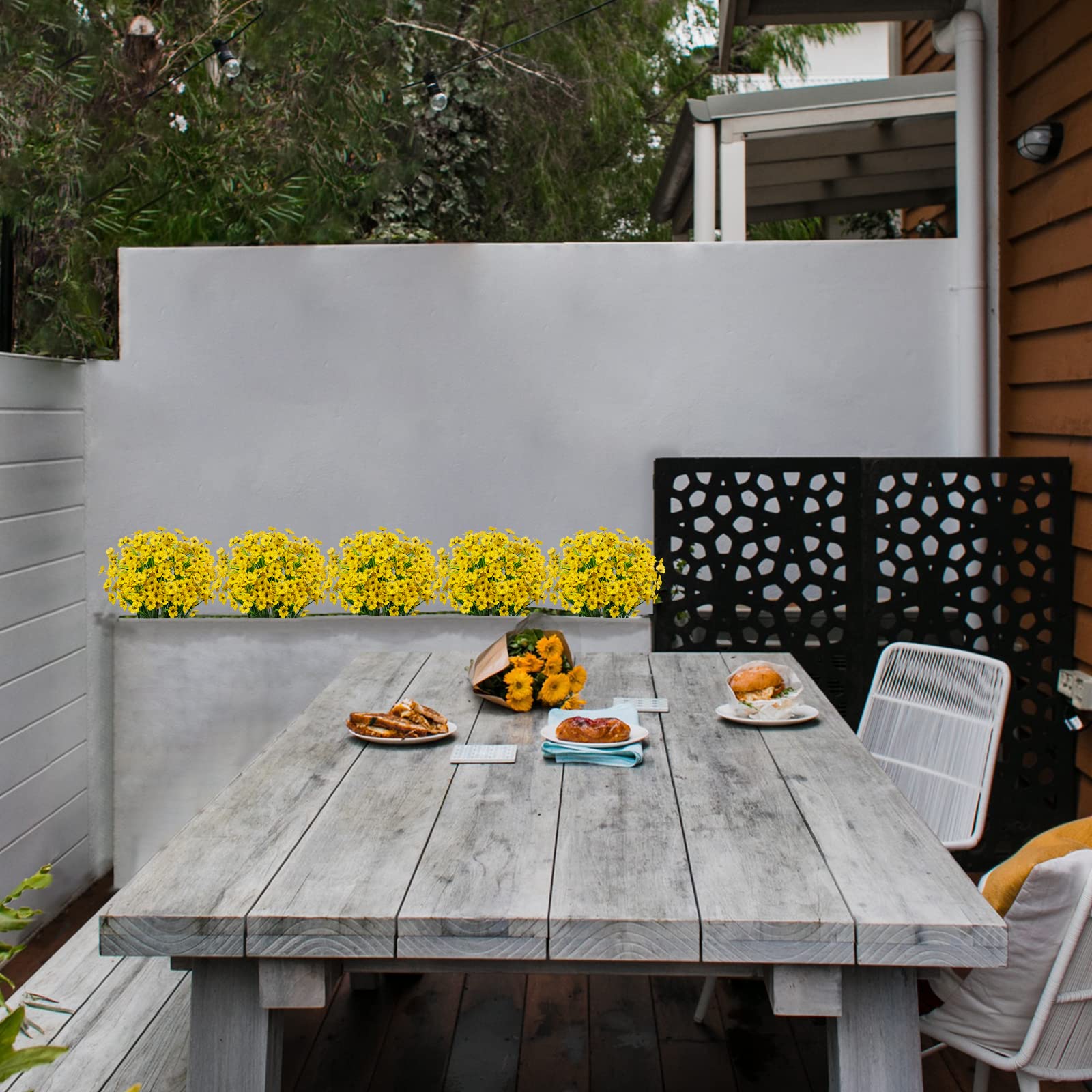 LikSoor fake greenery adds durable porch decor that resists wind and rain
