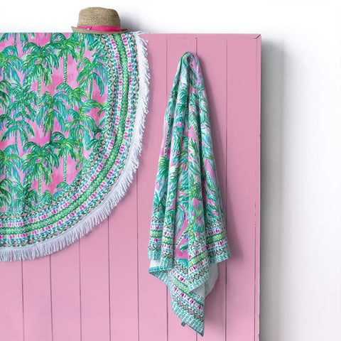 Lilly Pulitzer lightweight towel folds compactly for travel and vacation days.