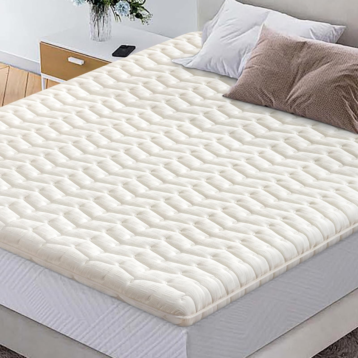 LILYVIBEBEARHAPPY premium foam topper unrolled on bed for even support.