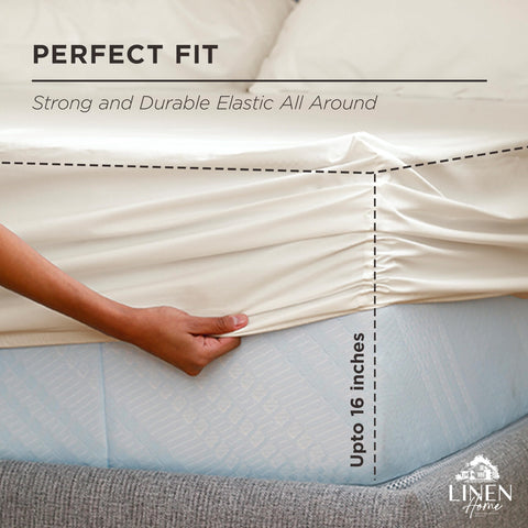 Linen Home fitted sheet with elastic around a 16 inch pocket for snug fit