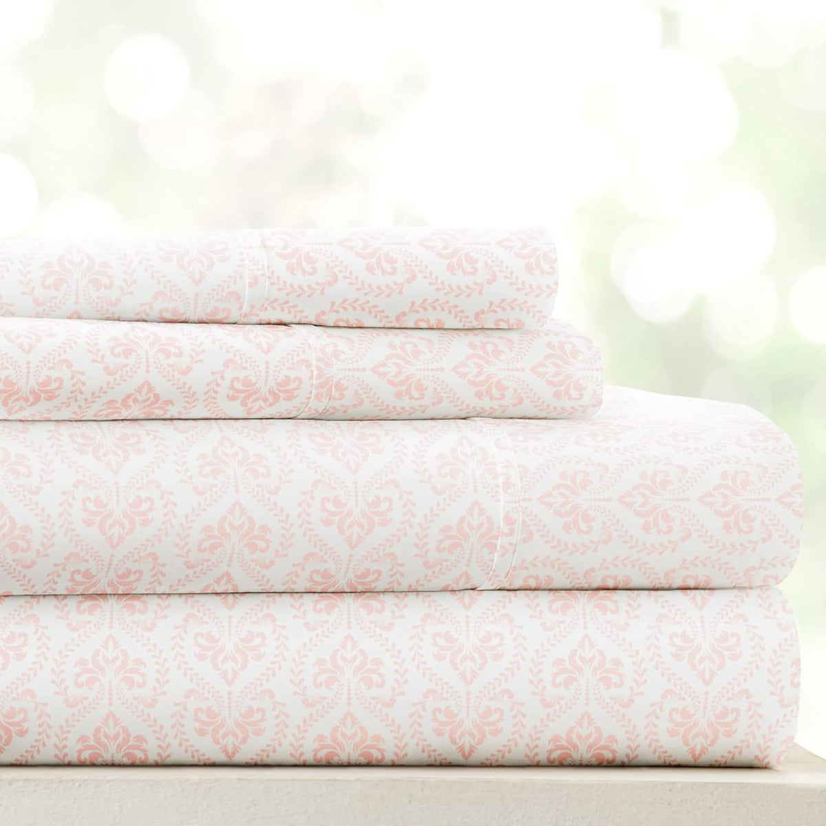 Linen Market patterned microfiber queen sheet set in pink, soft and breathable for restful nights