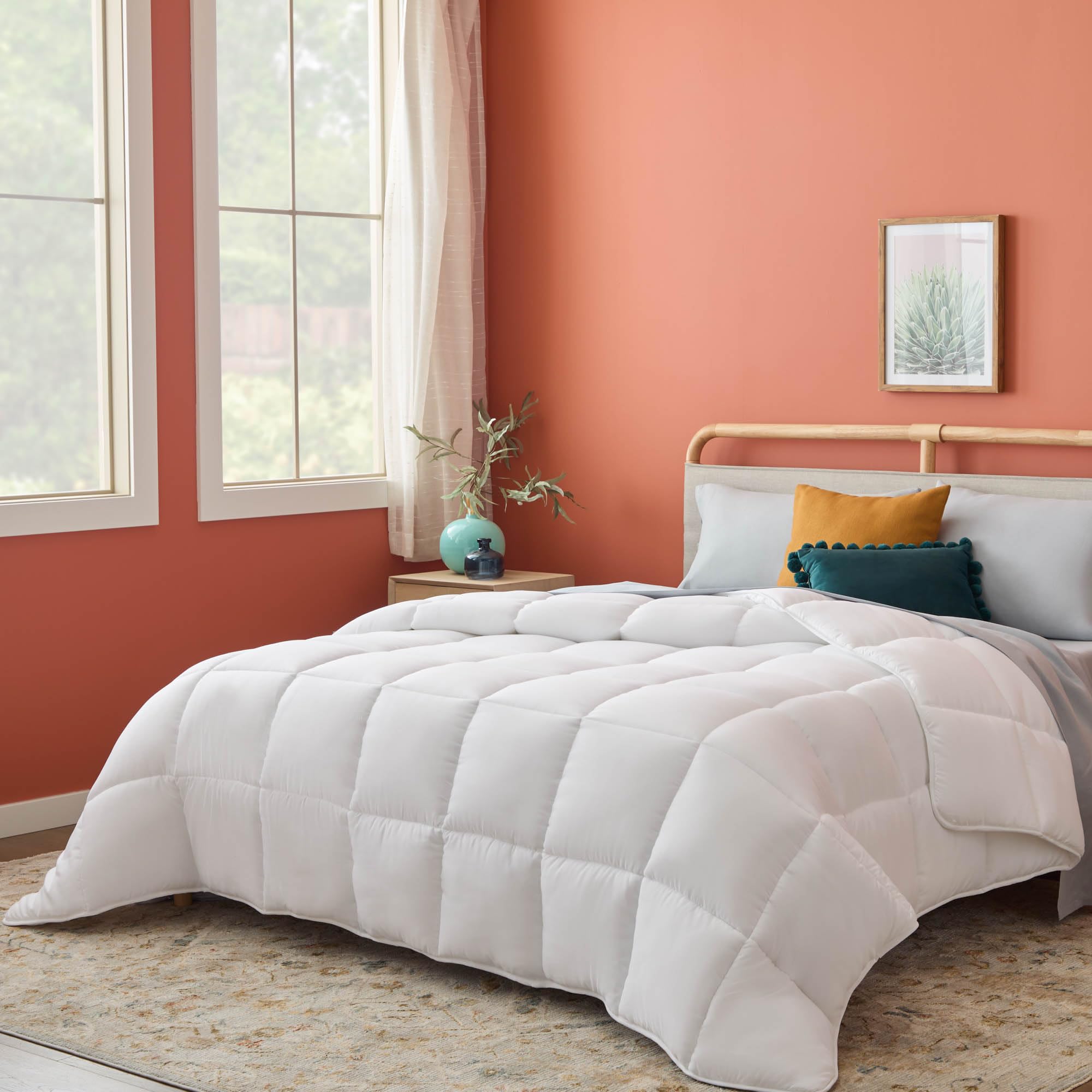 Linenspa white down-alternative comforter for king with box stitch keeps shape all-season.