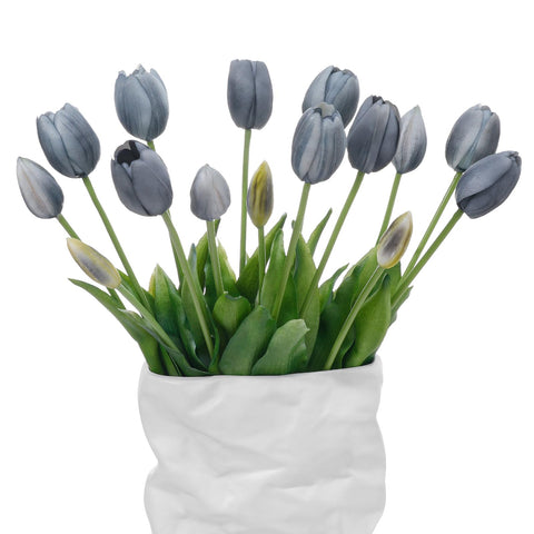 LINSIE orange tulips in three bundles ready for display in a centerpiece.