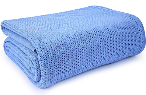 Linteum Blue Hospital Blanket 66x90 draped on a bed for patient comfort.