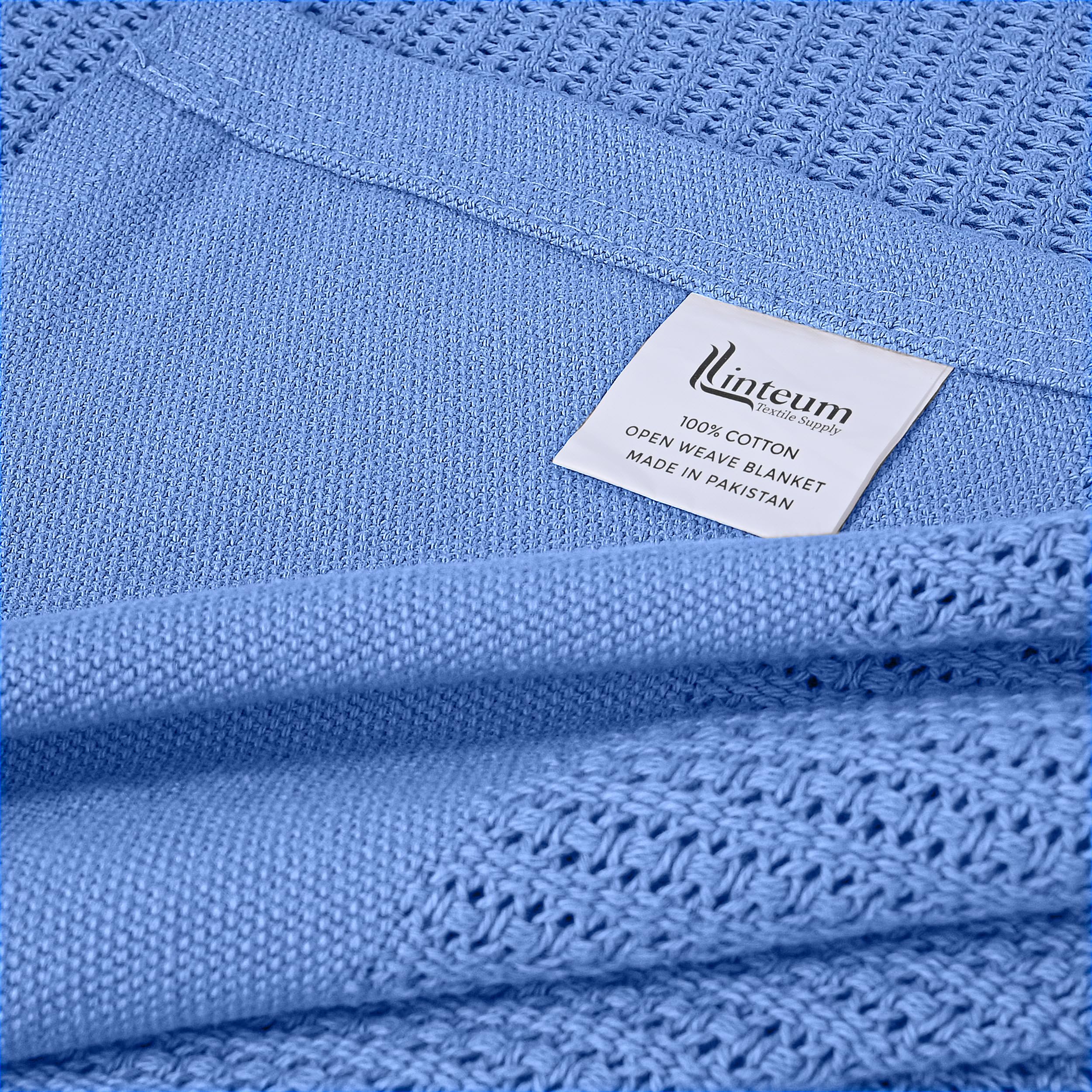 Linteum Blue blanket in a hospital-like room setting for versatility.