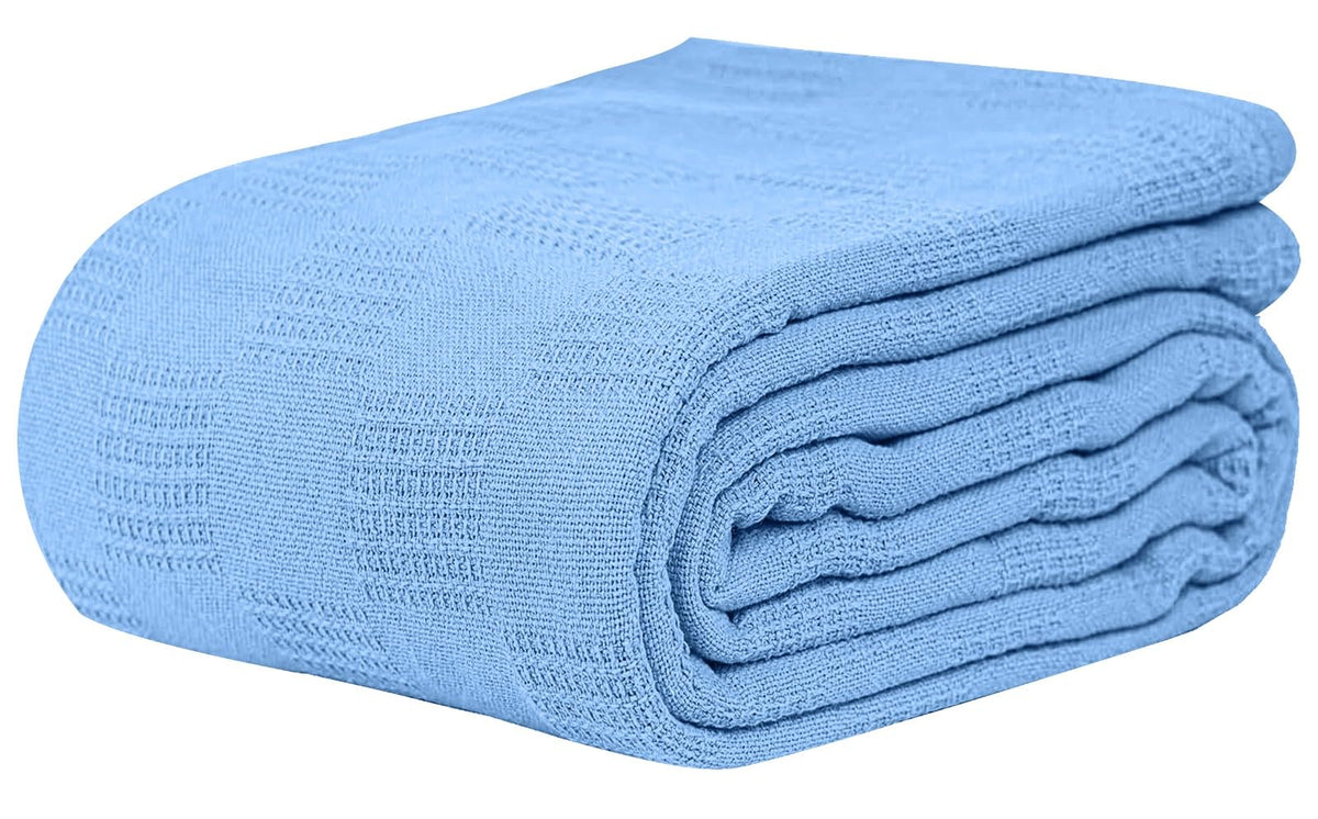 Linteum Hospital Thermal Snaggless Blanket laid flat on bed for warmth and coverage.