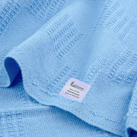 Blue textured cotton fabric from Linteum for year-round warmth.