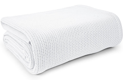 Linteum Textile Supply white hospital blanket close-up texture shows soft 100% cotton.