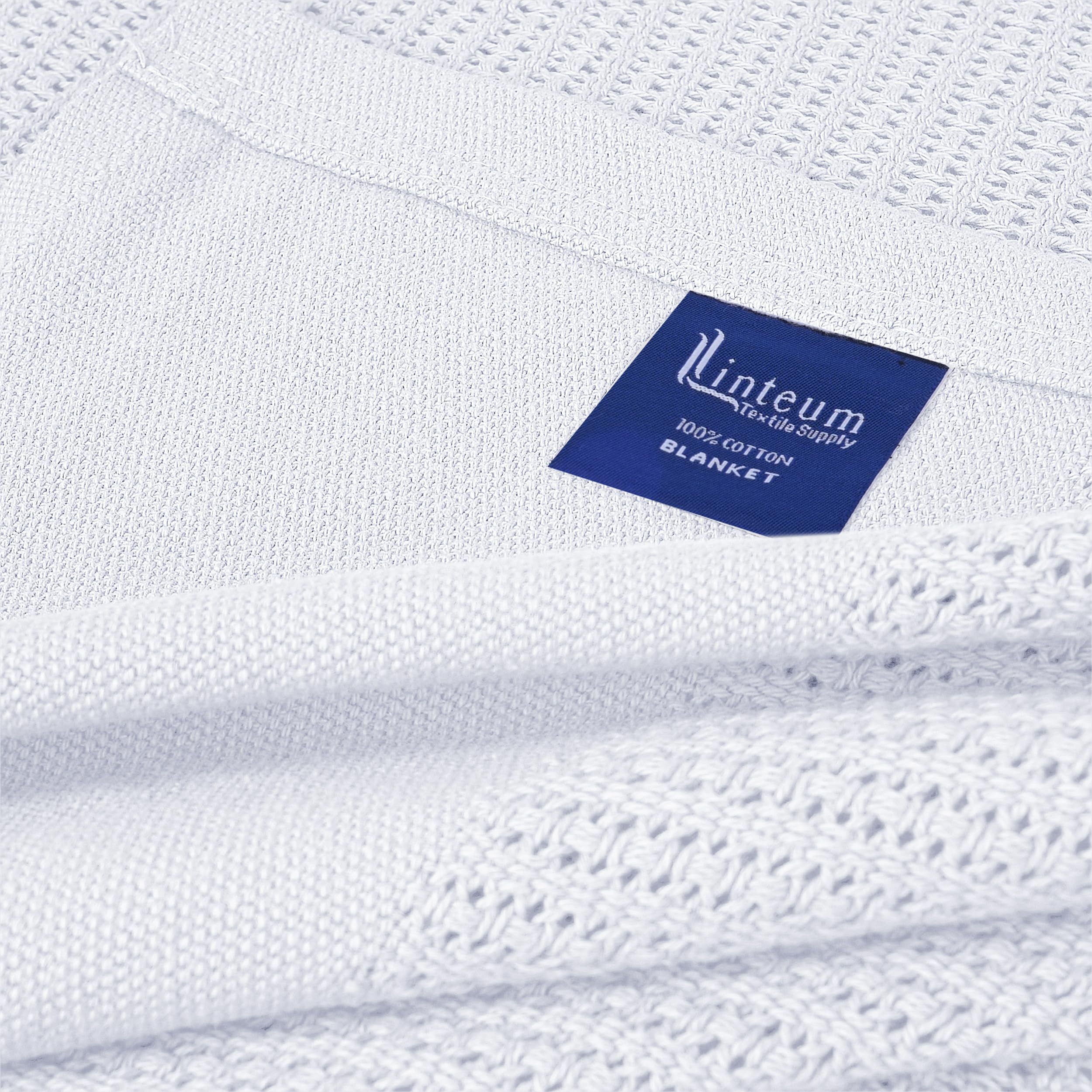 Linteum Textile Supply draped blanket on hospital bed for everyday use.