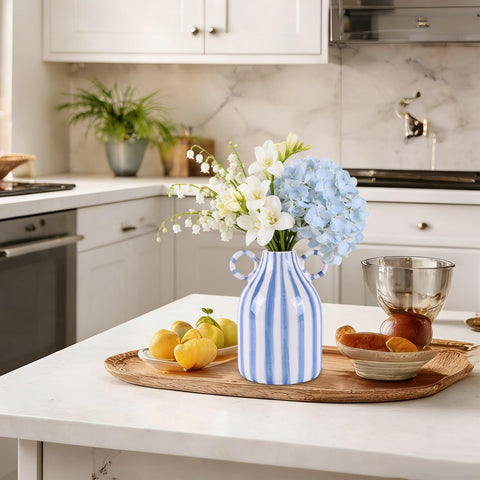 Round vase for flowers adding versatility to living spaces.