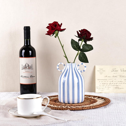 LINYTHER single flower display vase on bedside table.