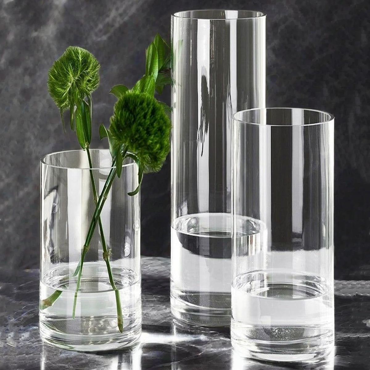 Liotww 8-inch acrylic cylinder vase with a slim, elegant silhouette for arrangements.