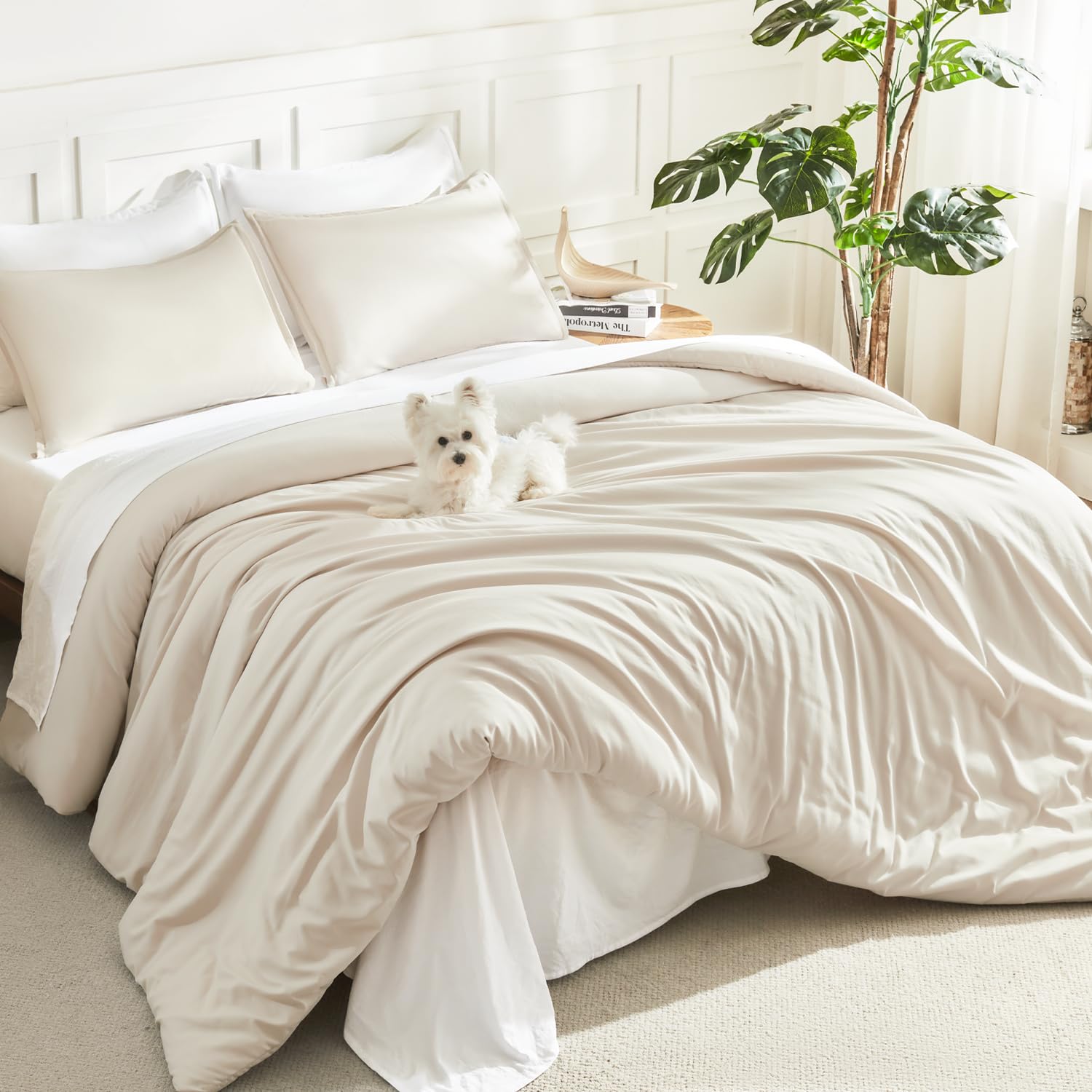 Litanika beige full-size comforter set on bed for lightweight, year-round warmth.