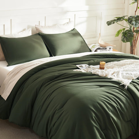 Litanika dark olive green styled bedroom showcases timeless bedding design.