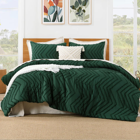 Litanika emerald comforter with chenille embroidery detail adds tactile elegance.