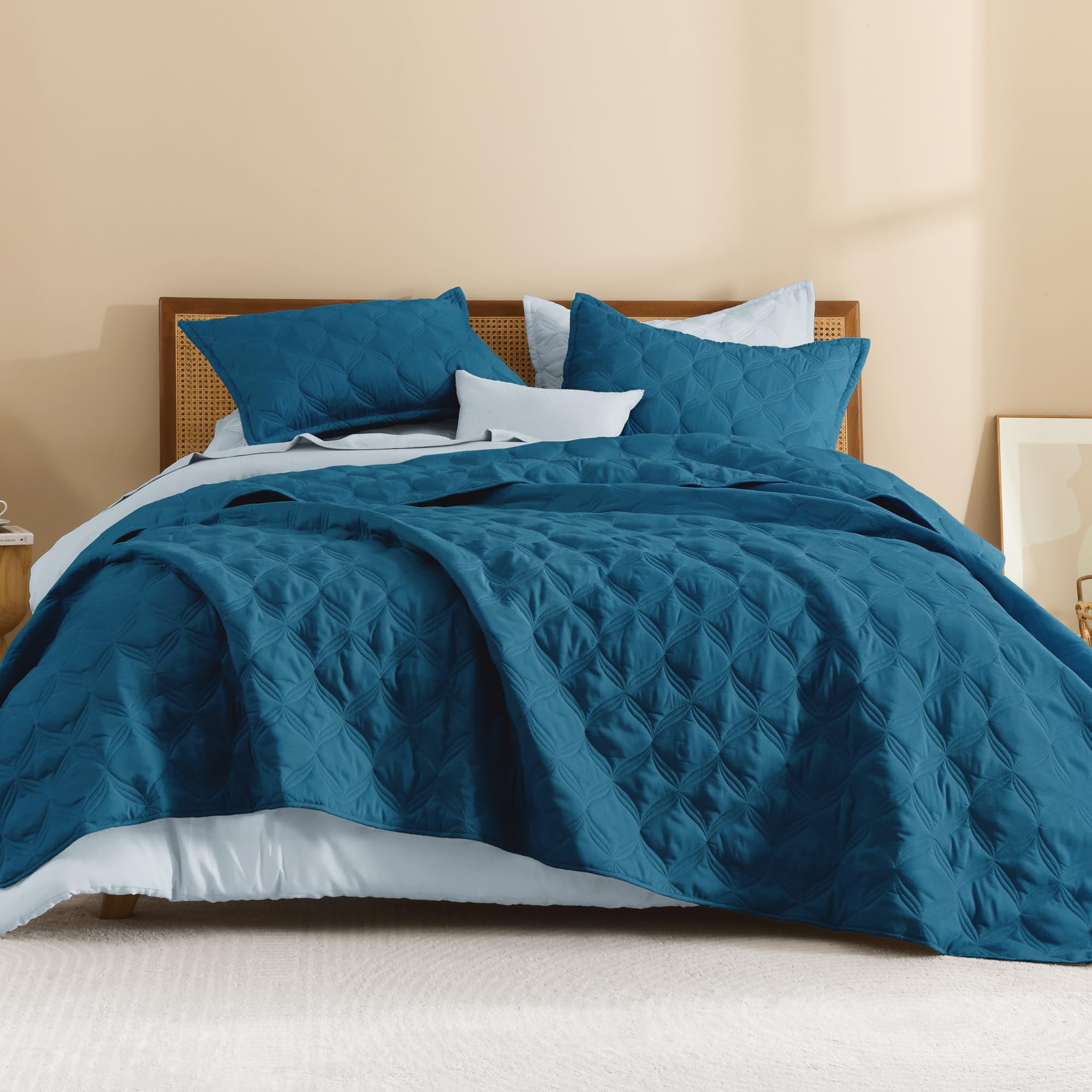 Litanika king size quilt teal back view with solid reverse color