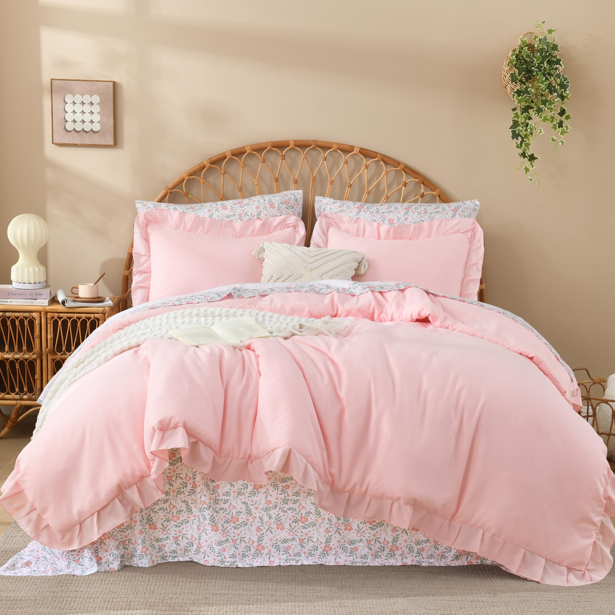 Litanika queen-size ruffle pink comforter close-up showing floral detail and soft texture.