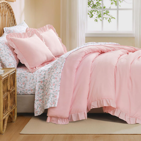 Litanika ruffled comforter close-up highlighting soft texture and decorative edge.