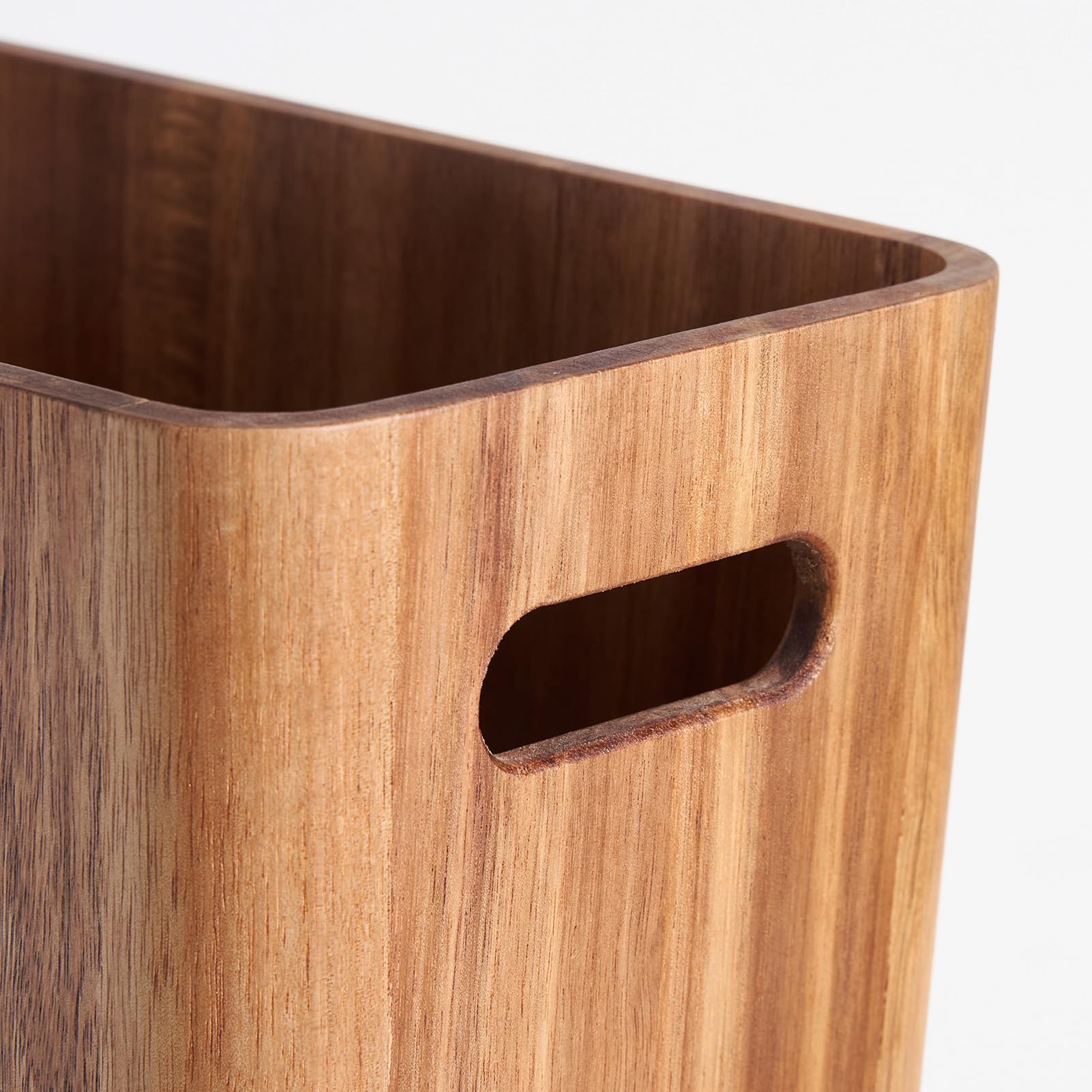 LiTY waste basket adds warm bedroom decor and organization.