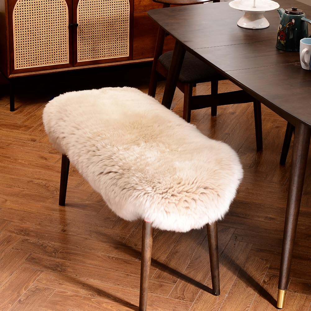 LLB sheepskin rug draped over chair in cream for cozy elegance